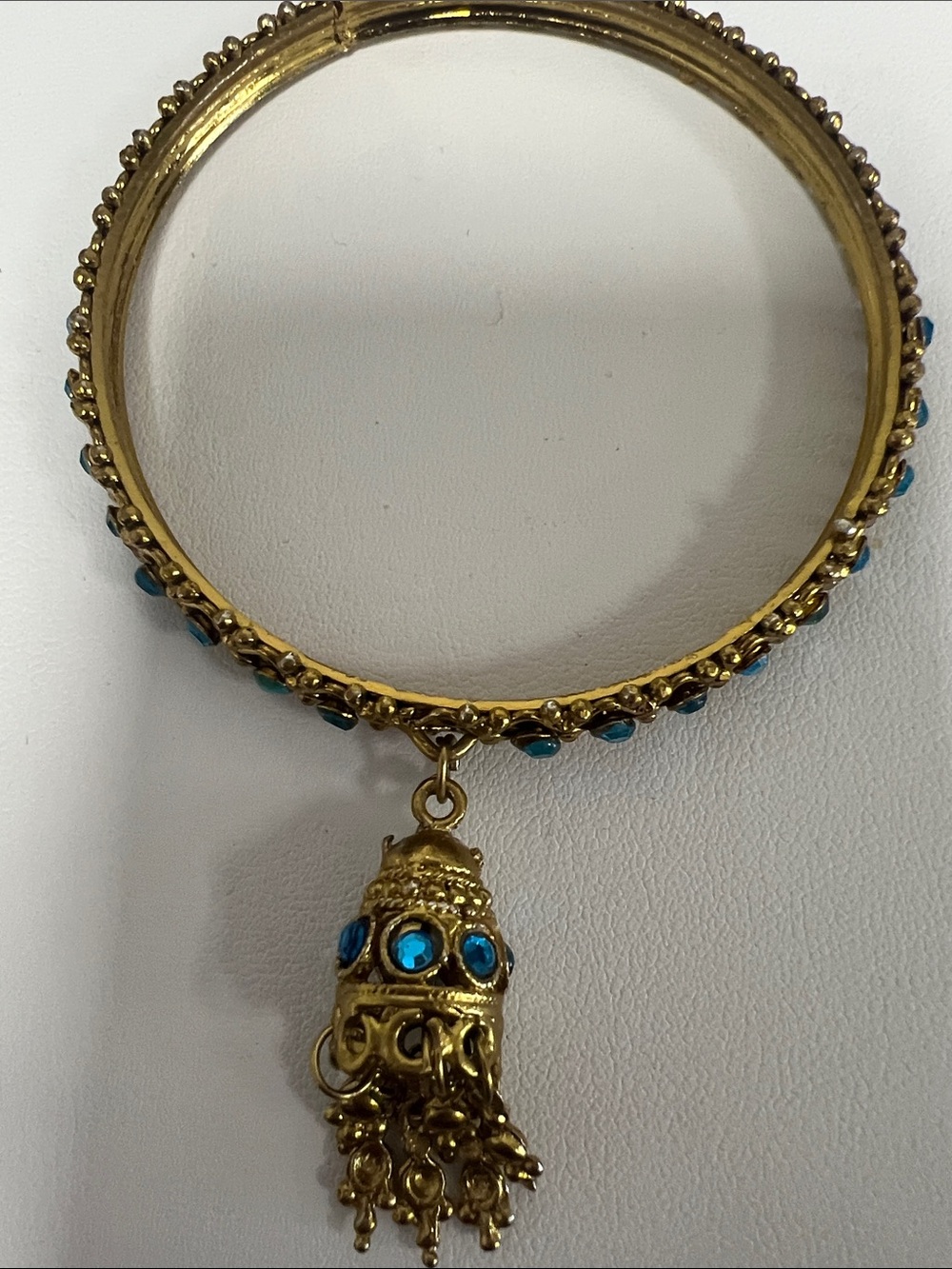 Gold-tone Bracelet with Blue Gemstone Tassel